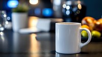 White ceramic mug mockup on dark counter with blurred kitchen background, warm lighting, and fresh fruit. Perfect for beverage branding, product design, and promotional graphics.