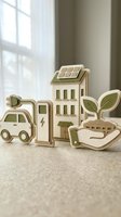 Wooden eco-friendly concept figures featuring electric car, charging station, solar building, and green plant in hand for sustainability design.