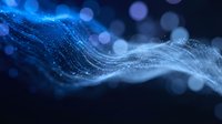 Abstract blue digital wave with glowing particles and bokeh lights creating futuristic data flow visualization for technology backgrounds and presentations.