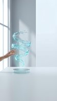 Hand pouring swirling turquoise water splash from container in bright studio setting with window light, suitable for wellness and hydration concepts.