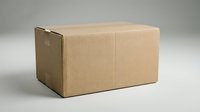 Closed kraft cardboard shipping box with handle cutout on neutral background, ready for packaging, delivery, storage, and logistics applications.