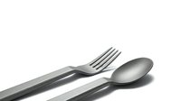 Modern stainless steel fork and spoon set on white background, isolated cutlery for kitchen dining and restaurant use with clean minimalist design.