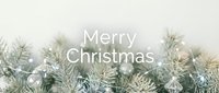 Merry Christmas greeting card with snowy pine branches and glowing fairy lights on a light background, festive holiday banner.