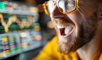 Shocked trader with beard and glasses reacting to stock market volatility, financial data charts displayed on blurred background.