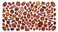 Assorted pecan nuts scattered on white background showing natural brown shells and meat textures for healthy snacking and cooking ingredients.