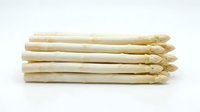 Fresh white asparagus spears stacked together, isolated on white background. Suitable for food, cooking, nutrition, and culinary design projects.