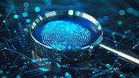 Glowing blue fingerprint under magnifying glass on digital circuit background, representing cybersecurity and biometric authentication technology.