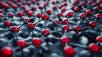Molecular structure with red atoms connected by silver bonds on dark surface, representing scientific research in nanotechnology.
