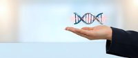 Scientist hand holding DNA helix model against blurred laboratory background, representing genetic research, biotechnology, and molecular biology innovation.