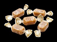 Sliced bread loaves in clear cellophane packaging with gold twist ties, isolated on transparent background. Ready for bakery, grocery, food design, print-on-demand, and packaging mockups.