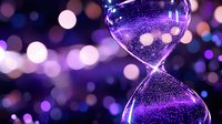 Glowing purple hourglass with flowing sand against blurred bokeh background creates magical atmosphere for concepts of time management and deadlines.
