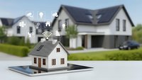 Smart home technology concept with miniature house model on tablet displaying wireless connectivity icons for automated residential systems and IoT devices.