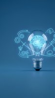 Light bulb with glowing brain and technology icons on blue background representing artificial intelligence innovation and creative thinking solutions.