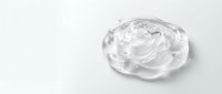 Clear gel or serum droplet with water bubbles on white background, isolated cosmetic product for skincare, beauty, and wellness design applications.