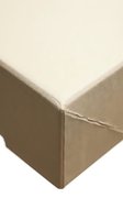 Minimalist brown cardboard shipping box corner detail on white background for packaging and delivery concepts.