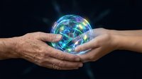 Two hands holding glowing digital globe with network connections representing global technology, communication and data transfer on dark background.