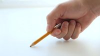 Hand holding sharpened wooden pencil on white surface for writing, drawing, sketching, art projects, education, and creative work.