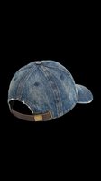 Vintage denim baseball cap with brown leather back strap, isolated on transparent background. Ready for t-shirt design, print-on-demand, sublimation, stickers, and clipart projects.