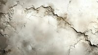 Cracked and peeling plaster wall texture with rough surface damage showing layers of deterioration and weathered patina in neutral beige and gray tones.