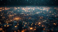 Magical glowing orange and blue bokeh lights scattered across dark background with sparkle effect, creating dreamy atmospheric mood for festive designs.