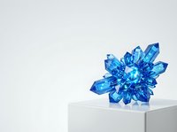 Vibrant blue crystal cluster with geometric facets isolated on white cube pedestal, suitable for luxury branding, jewelry design, and modern product displays.
