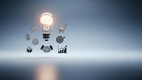 Glowing light bulb with business icons representing innovation, creativity, teamwork, growth, and strategic planning for corporate success and entrepreneurship.