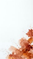 Abstract watercolor splash in warm autumn tones with organic flowing shapes and paint splatters on white background for creative design projects.