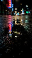 Empty bottle lying on wet street at night with colorful neon lights reflecting on pavement. Urban nightlife scene for design projects.