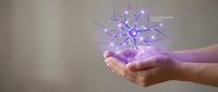 Hands holding glowing purple neural network connections representing artificial intelligence, technology innovation, and digital transformation concepts.