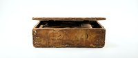 Vintage weathered wooden box with hinged lid open revealing dark interior isolated on white background for antique design projects.