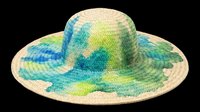 Wide brim straw sun hat with blue and green tie-dye pattern, isolated on transparent background. Great for fashion clipart, stickers, t-shirt design, and print on demand.