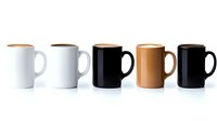Five white, black, and brown - arranged in row on white background, isolated product photography for commercial use.