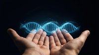 Human hands holding glowing DNA double helix structure with blue light effects against dark background for genetic research and biotechnology concepts.