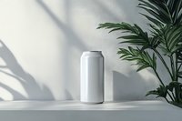 White aluminum can mockup with palm leaves shadow on light background, minimal product presentation for beverage packaging design and branding.