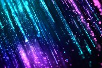 Glowing diagonal lines with sparkles and bokeh effects in vibrant neon blue and purple colors against dark background create magical abstract pattern.