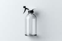 Clear spray bottle with black trigger sprayer on white background, minimalist composition showing empty transparent container for cleaning products or cosmetics solutions.