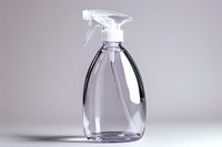 Clear plastic spray bottle with white trigger sprayer on neutral gray background, minimalist product photography for cleaning and household concepts.