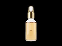 Luxury golden facial serum or oil in glass dropper bottle with gold cap, isolated on transparent background. Ready for cosmetics, skincare, beauty product design, print-on-demand, and packaging mockups.