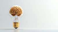 Creative concept showing human brain inside light bulb on white background, symbolizing innovation, ideas and cognitive intelligence. Minimal composition.