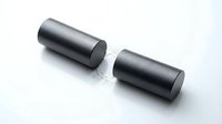 Two black metallic cylindrical objects on white background, industrial components or battery cells isolated for design and manufacturing concepts.