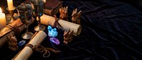 Mystical fortune telling setup with tarot cards, crystals, candles and ancient scrolls on dark fabric for divination and spiritual guidance sessions.