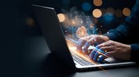 Professional typing on laptop with glowing digital network icons and connectivity symbols emerging from screen in dark modern workspace for technology concepts.