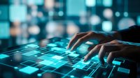 Hands typing on glowing digital interface with blue grid pattern and bokeh city lights background, representing technology, data processing, and digital innovation.