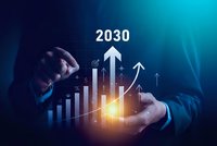 Businessman hands presenting glowing growth chart with 2030 year projection and upward arrows on blue gradient background for strategic planning.
