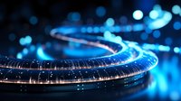 Glowing fiber optic cable with blue light effects and bokeh background creates futuristic technology concept for digital communications and networking.