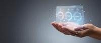 Hand holding digital holographic interface with glowing network icons and connected nodes, representing technology, innovation, and digital transformation for business solutions.