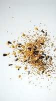 Mixed seeds and grains scattered on white background including sunflower seeds, quinoa, corn kernels creating healthy nutrition concept for cooking recipes.