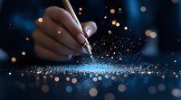 Female hand holding pen creating magical sparkles and light trails on dark blue background with bokeh effect, concept of creativity and inspiration.
