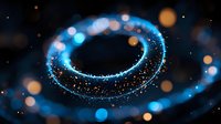 Magical glowing blue spiral light trail with sparkles and bokeh effects against dark background creates mesmerizing abstract cosmic atmosphere.