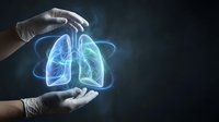 Medical professional hands protecting glowing lung hologram on dark background representing respiratory health care and pulmonary medicine concepts.